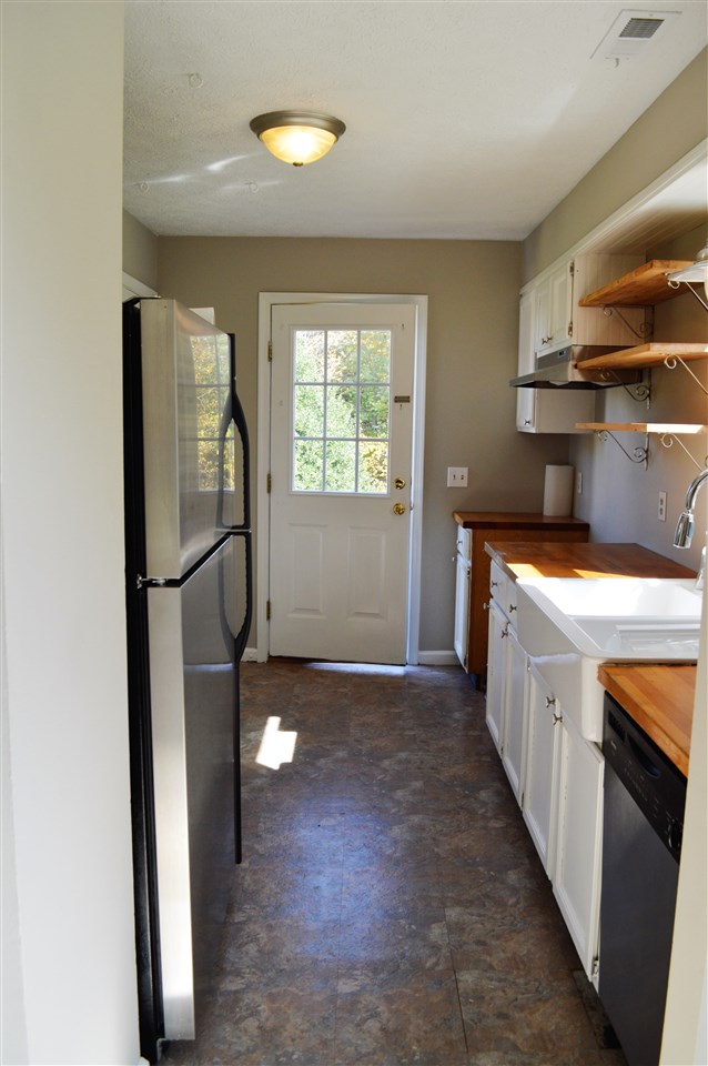 12084 Cross County Road Mineral, VA 23117 - Photo 6 of 23 New sink, fixtures, and stainless steel appliances. (New stove is on the way!)