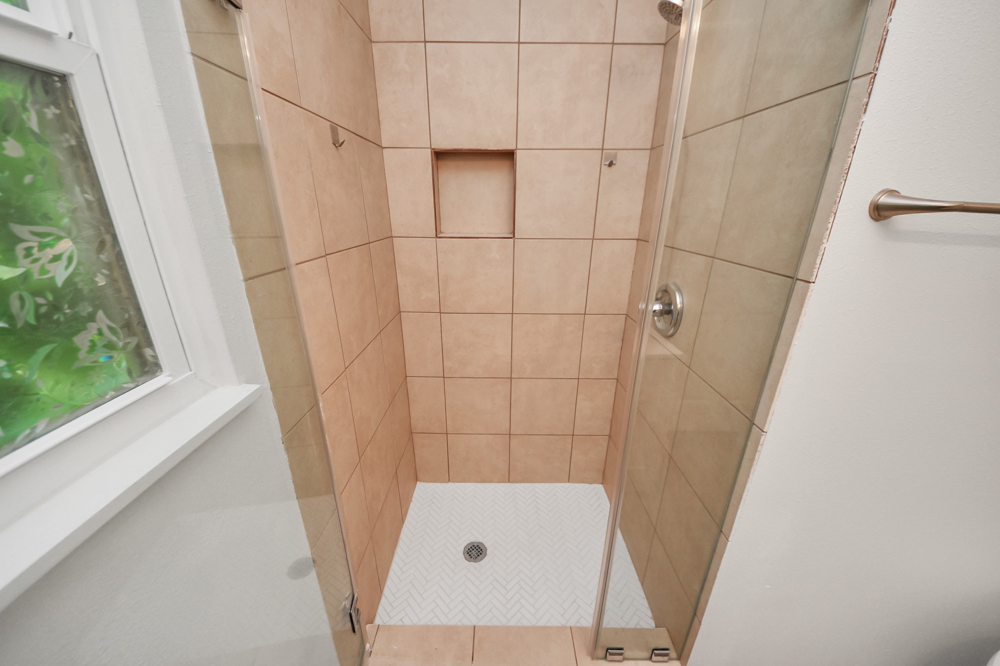 7004 Conley Street Houston, TX 77021 - Photo 12 of 32 a bathroom with a sink and a shower