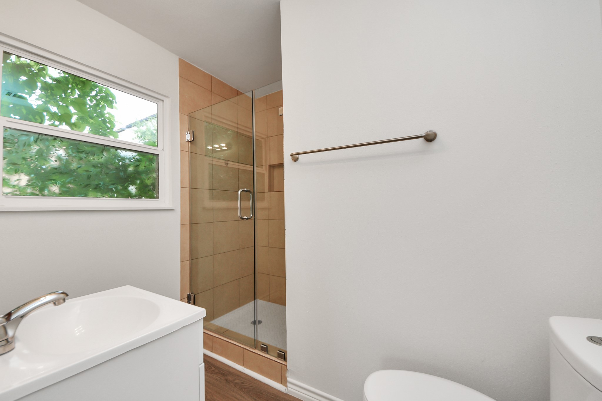 7004 Conley Street Houston, TX 77021 - Photo 14 of 32 a bathroom with a sink toilet and shower