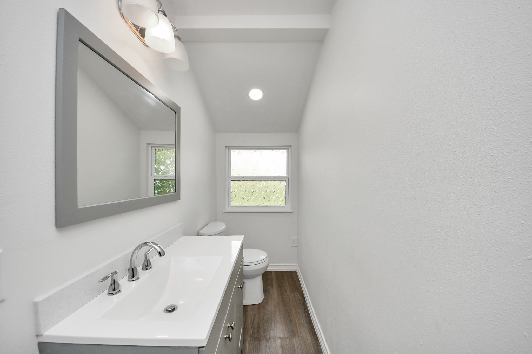 7004 Conley Street Houston, TX 77021 - Photo 17 of 32 a bathroom with a sink and a mirror