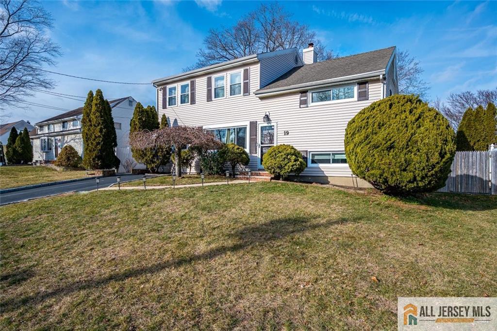 19 Oxford Road East Brunswick, NJ 08816 - Photo 2 of 41 a view of a house with a backyard