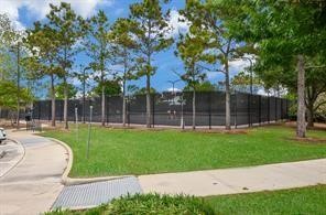 25411 Overbrook Terrace Lane Katy, TX 77494 - Photo 26 of 30 Proud shade trees almost seem to be guarding the huge community tennis courts!