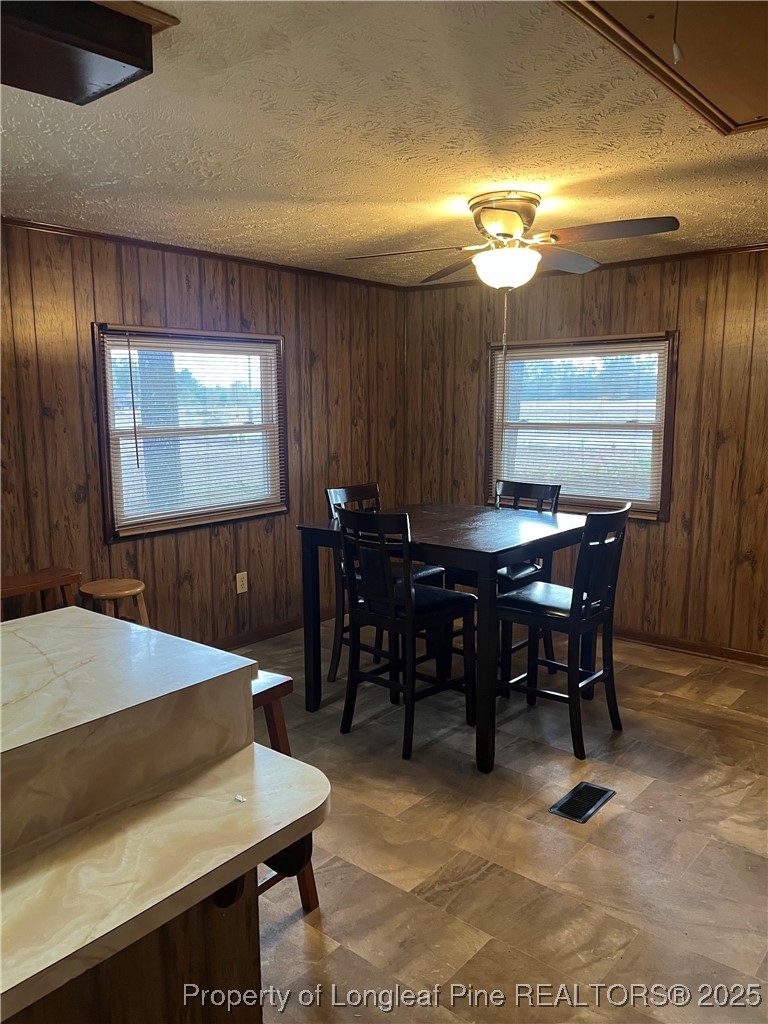 1922 Evergreen Church Road Pembroke, NC 28372 - Photo 11 of 31 a view of a dining room with furniture