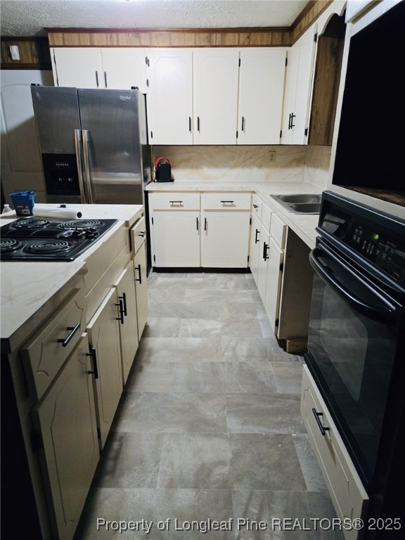 1922 Evergreen Church Road Pembroke, NC 28372 - Photo 14 of 31 a kitchen with a sink stove and cabinets