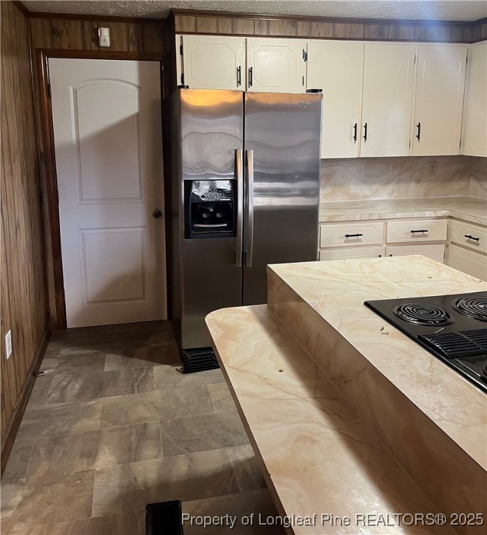 1922 Evergreen Church Road Pembroke, NC 28372 - Photo 15 of 31 a kitchen with a refrigerator and a stove