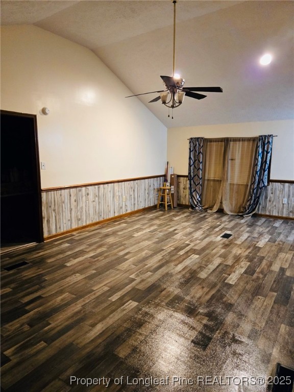 1922 Evergreen Church Road Pembroke, NC 28372 - Photo 16 of 31 a view of a room with wooden floor and ceiling fan