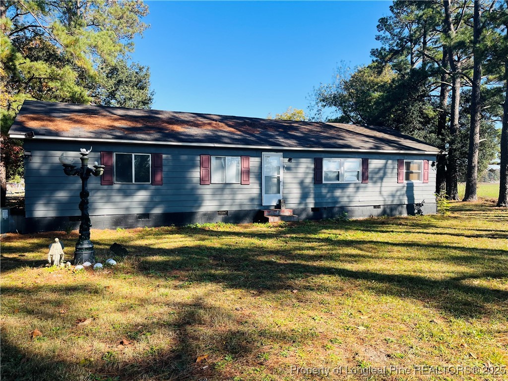 1922 Evergreen Church Road Pembroke, NC 28372 - Photo 2 of 31 a view of a house with a swimming pool