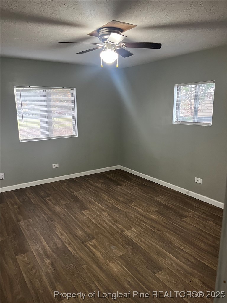 1922 Evergreen Church Road Pembroke, NC 28372 - Photo 24 of 31 a view of empty room with wooden floor and fan