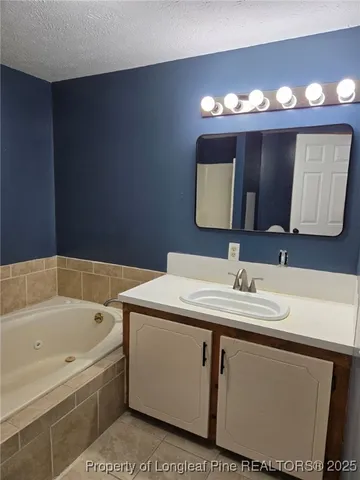 a white toilet sitting next to a shower