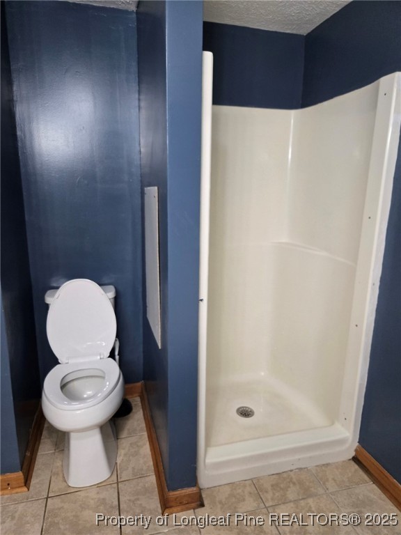 1922 Evergreen Church Road Pembroke, NC 28372 - Photo 30 of 31 a white toilet sitting next to a shower