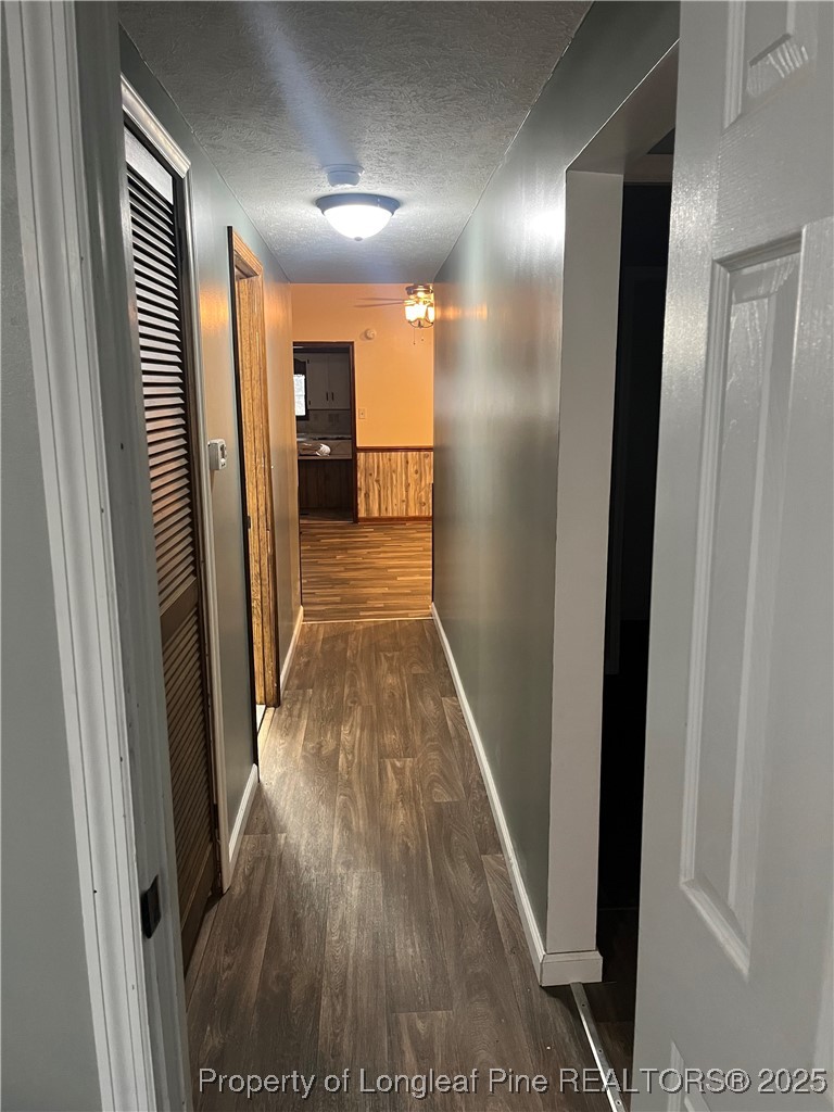 1922 Evergreen Church Road Pembroke, NC 28372 - Photo 31 of 31 a view of hallway with wooden floor