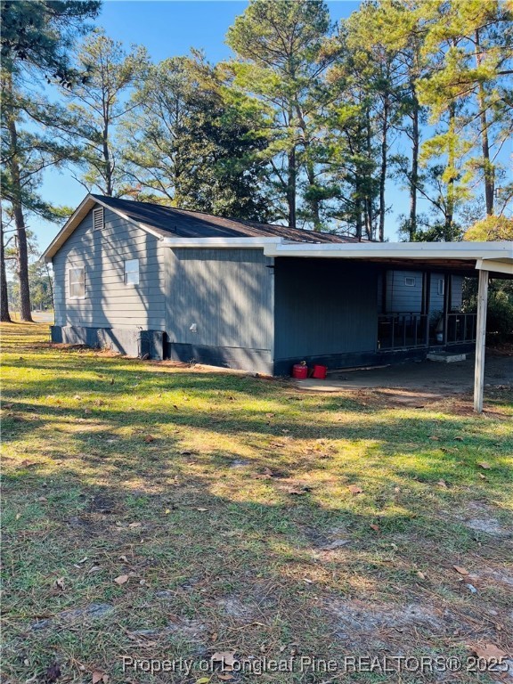 1922 Evergreen Church Road Pembroke, NC 28372 - Photo 4 of 31 a view of swimming pool with a yard