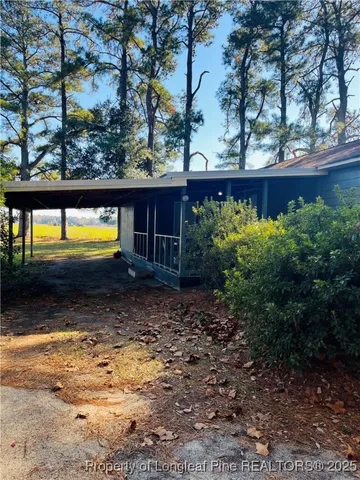 a view of swimming pool from a outdoor space