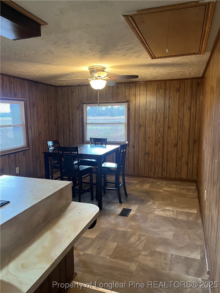 1922 Evergreen Church Road Pembroke, NC 28372 - Photo 10 of 31 a view of a dining room with furniture