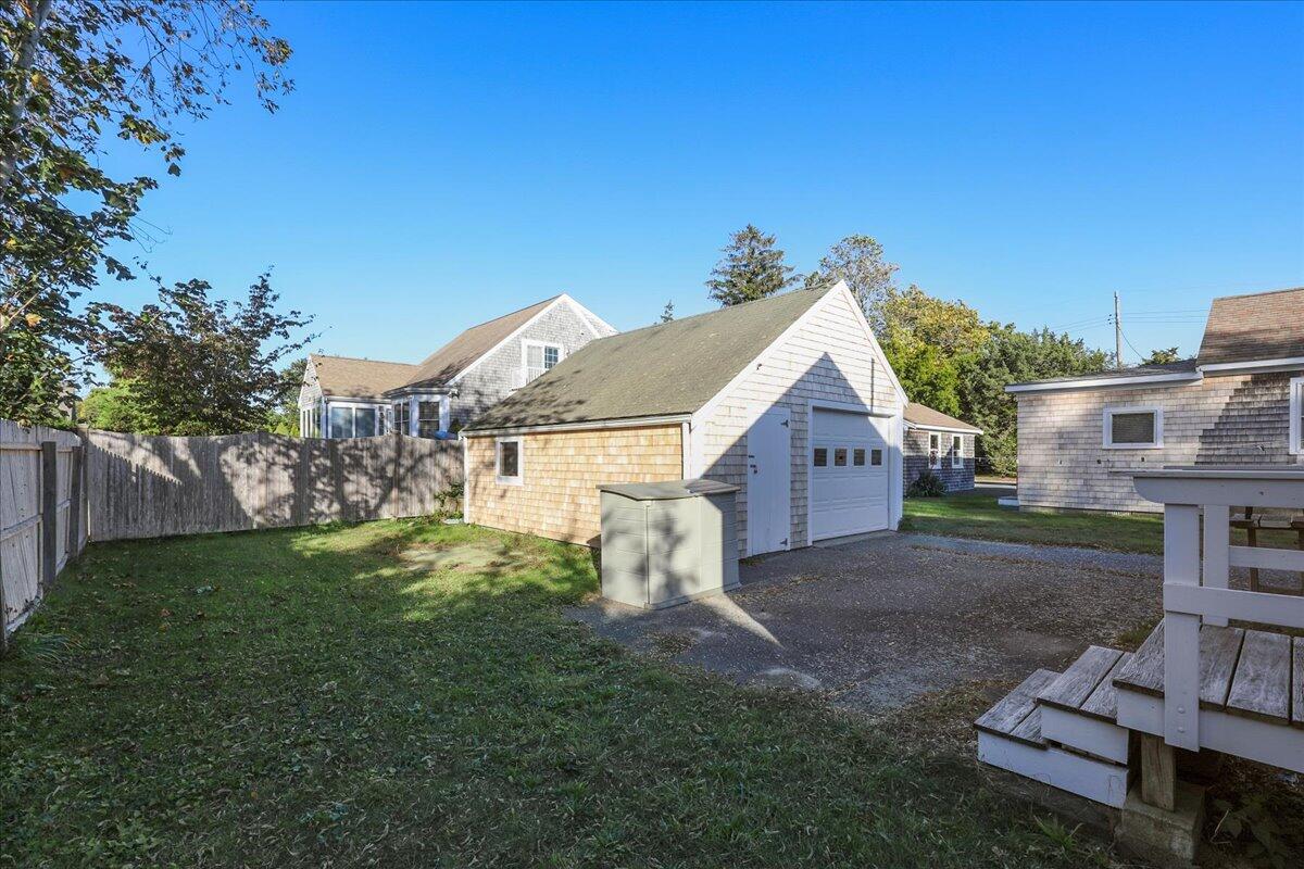 126 Commerce Road Barnstable, MA 02630 - Photo 19 of 30 a view of house with a yard