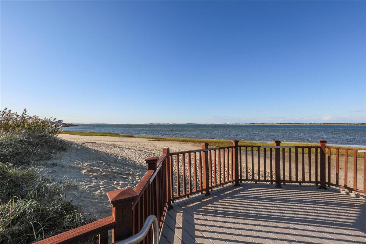 126 Commerce Road Barnstable, MA 02630 - Photo 26 of 30 a balcony with an ocean view