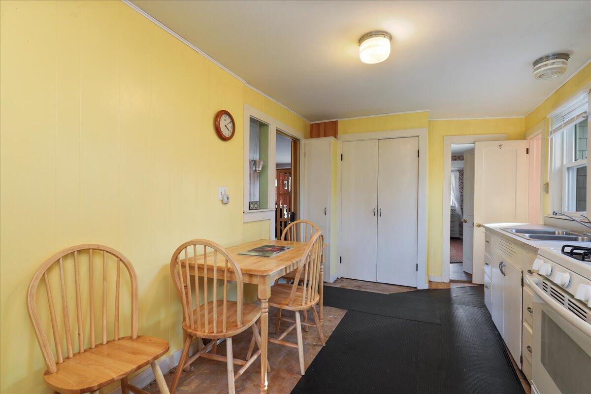 126 Commerce Road Barnstable, MA 02630 - Photo 10 of 30 a view of a kitchen with furniture and wooden floor