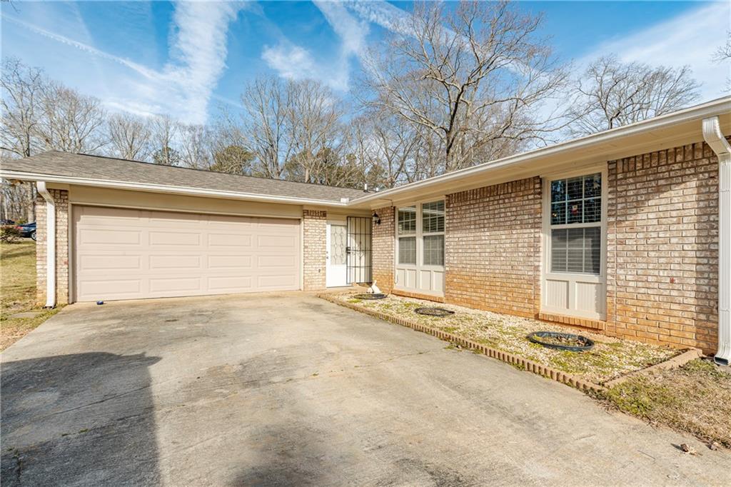 4825 Huntlea Court Decatur, GA 30034 - Photo 1 of 1 a view of a house with a outdoor space