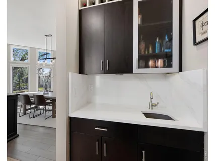 a kitchen with a sink and a cabinets