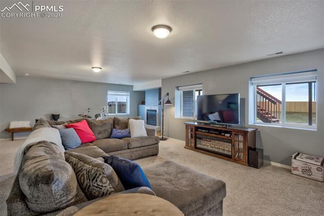 8345 Fort Smith Road Peyton, CO 80831 - Photo 38 of 50 Another view of the family room
