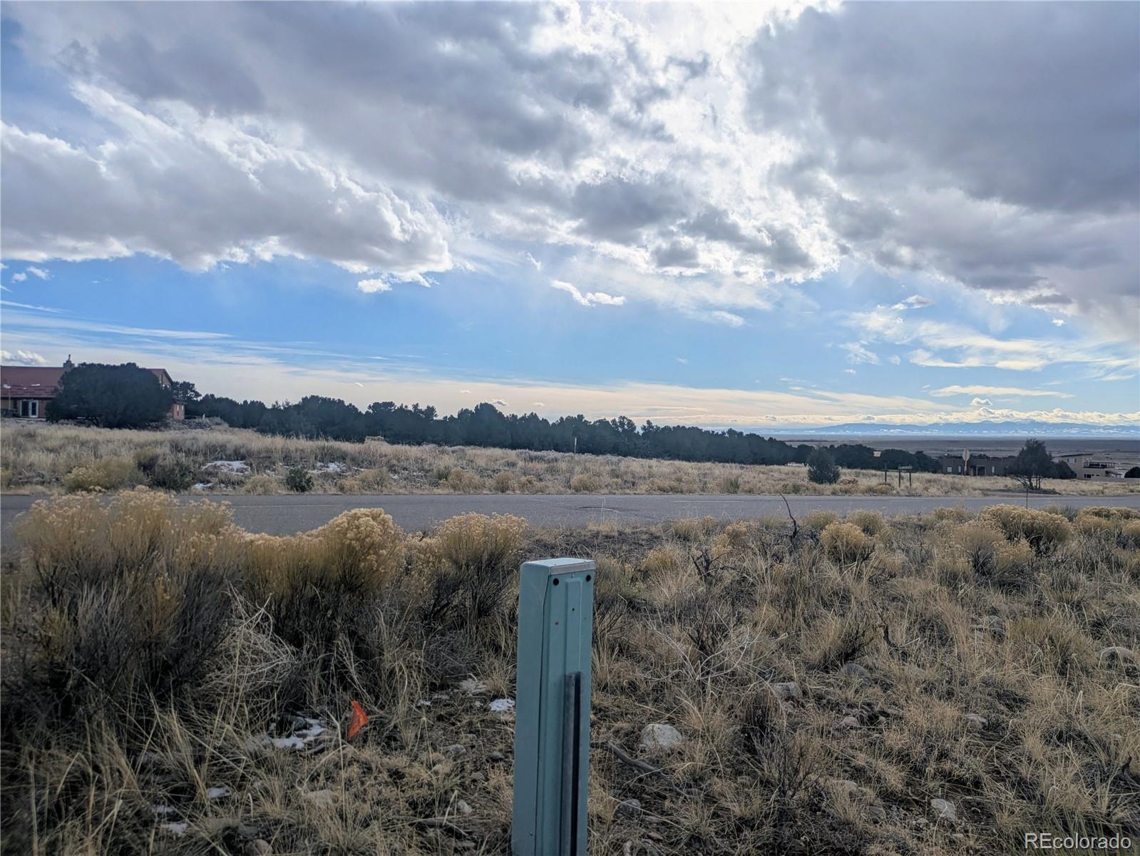 3288 Camino Del Rey Crestone, CO 81131 - Photo 2 of 11 a view of a lake with mountains in the background