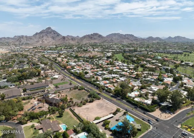 an aerial view of residential house with an outdoor space