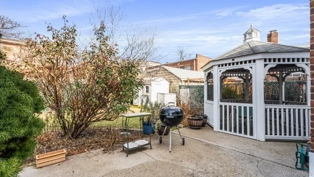 a view of building with outdoor seating area