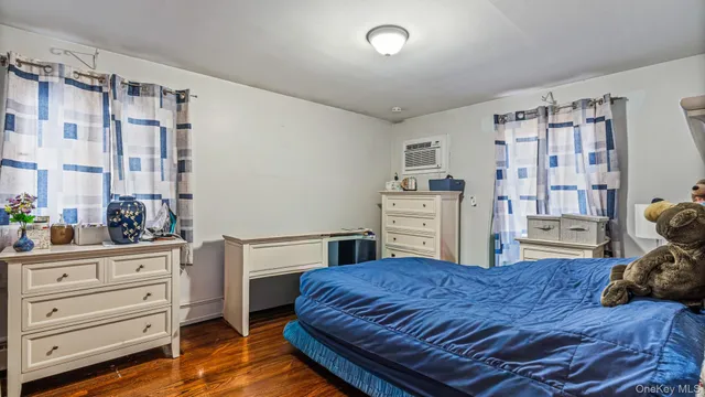 a bedroom with a bed and furniture