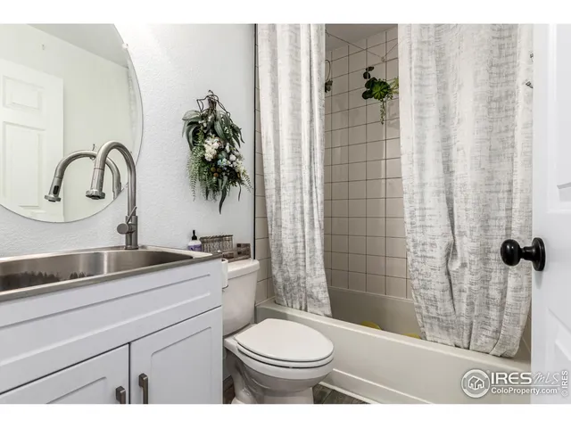 a close view of a utility room with washer and dryer