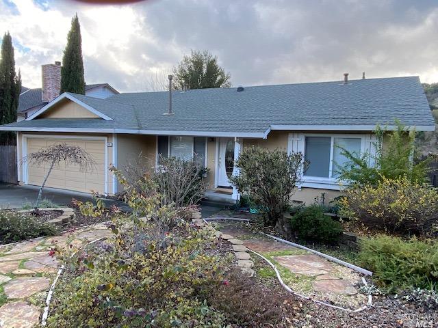 171 Michele Circle Novato, CA 94947 - Photo 1 of 1 a front view of a house with garden