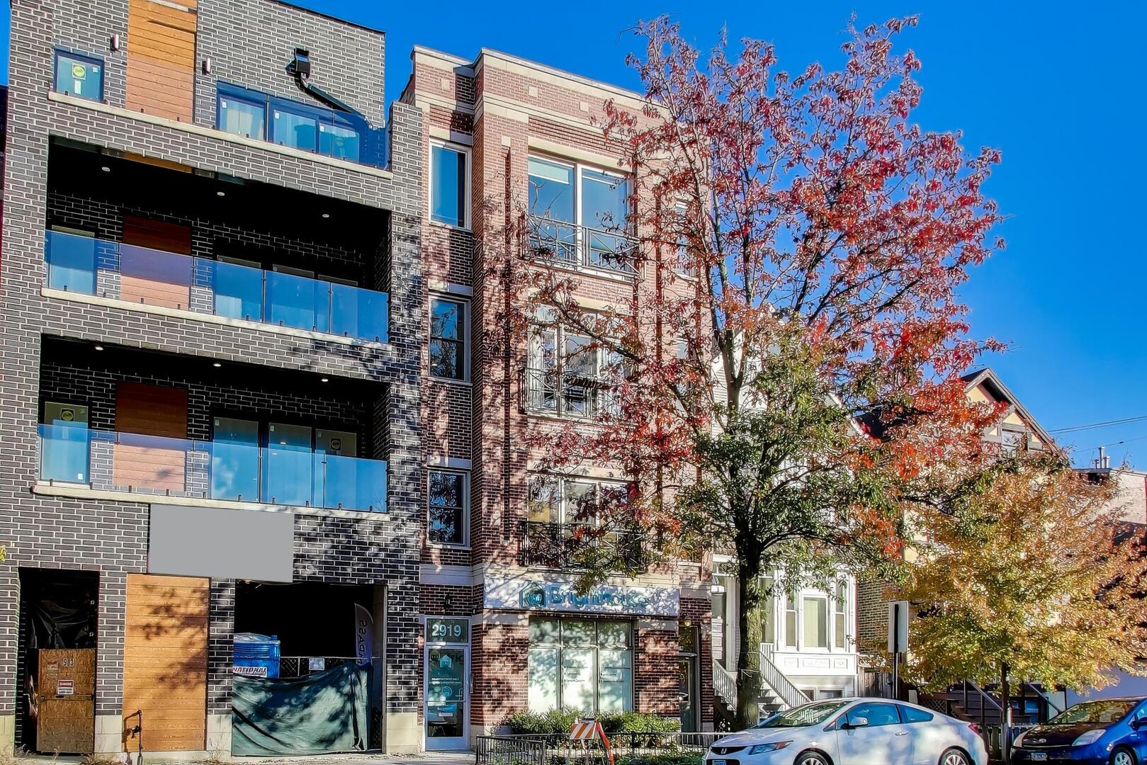 a view of a building with a street