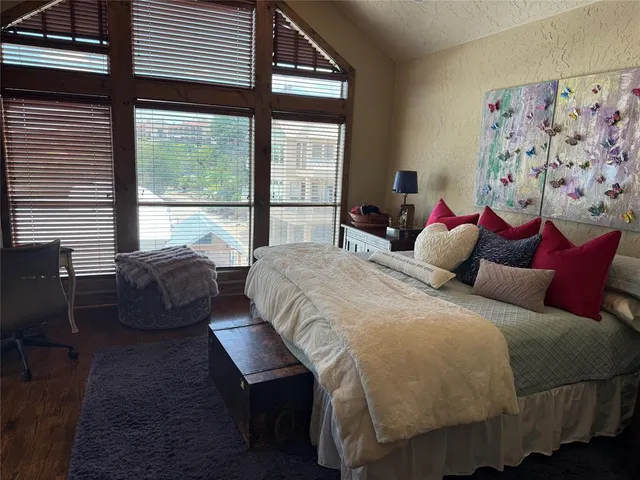a white toilet sitting next to a shower curtain