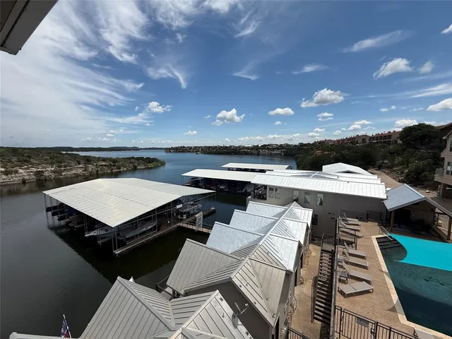 a terrace of a house with outdoor seating