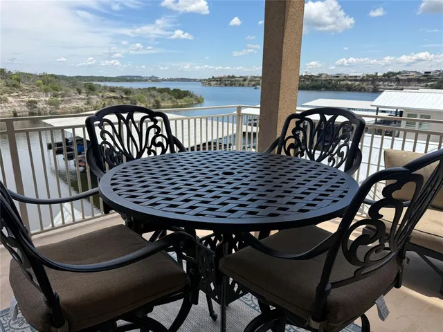 a view of a terrace with sitting area
