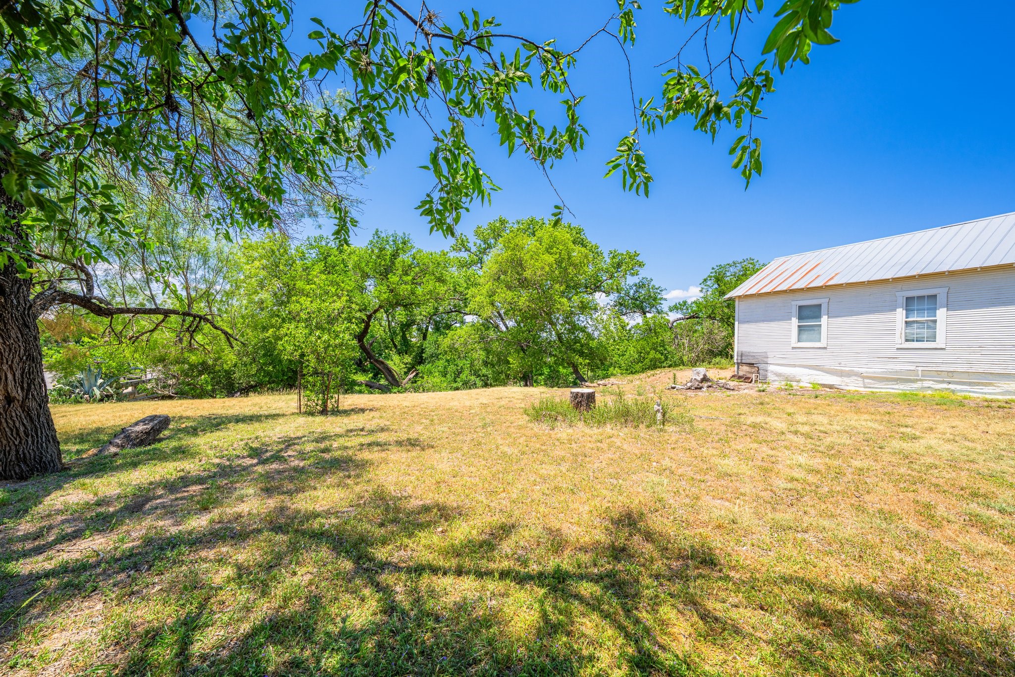 208 Francisco Lemos Street Kerrville, TX 78028 - Photo 22 of 29 a view of a house with a yard
