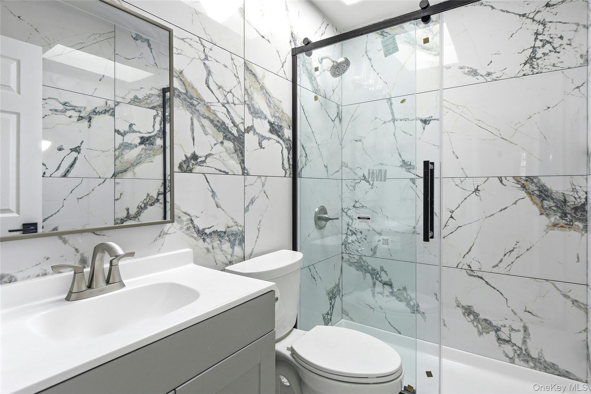56 Pennaquid Road Coram, NY 11727 - Photo 15 of 29 First floor bathroom