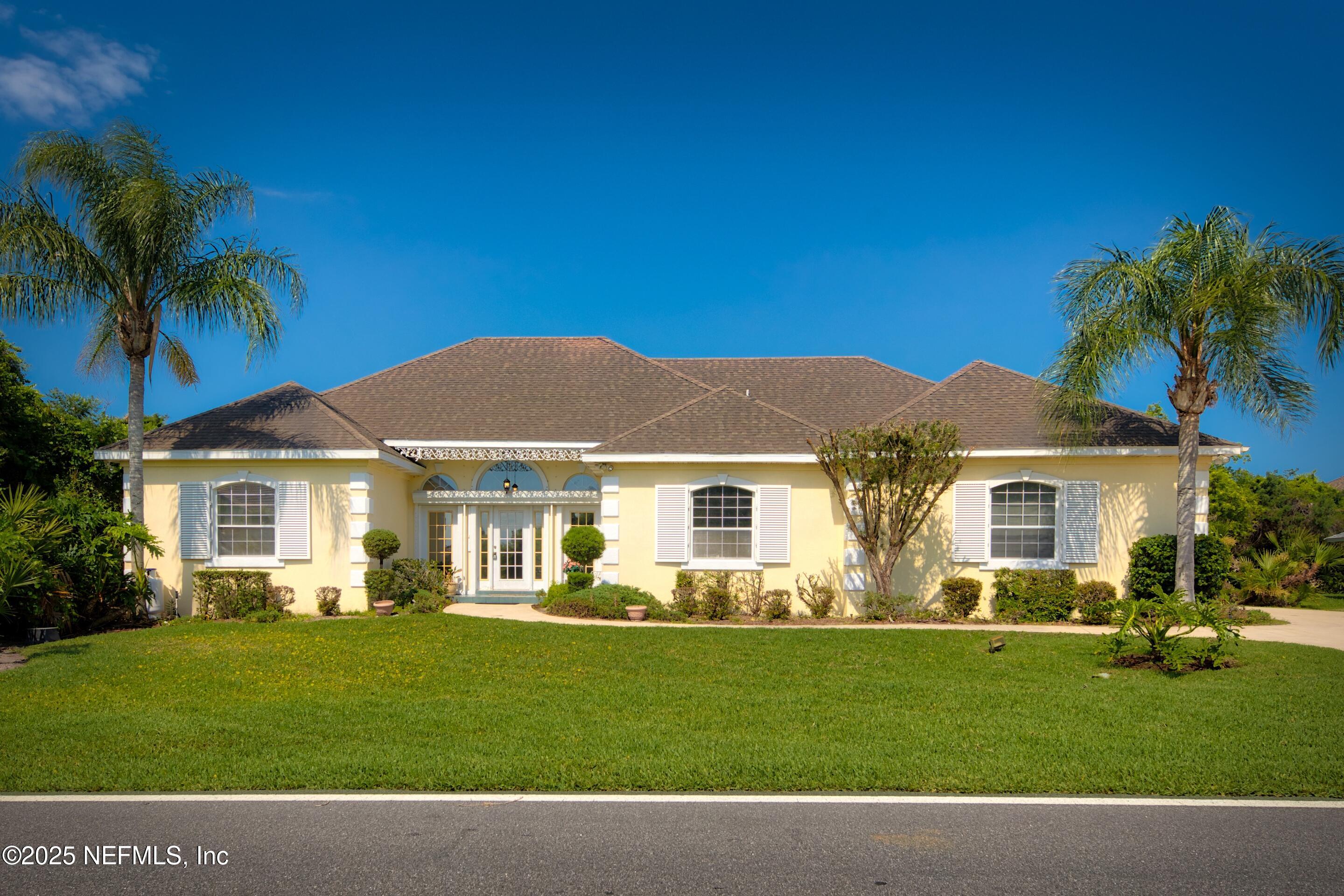 430 Marsh Point Circle St. Augustine, FL 32080 - Photo 1 of 69 a view of a yard in front of a house