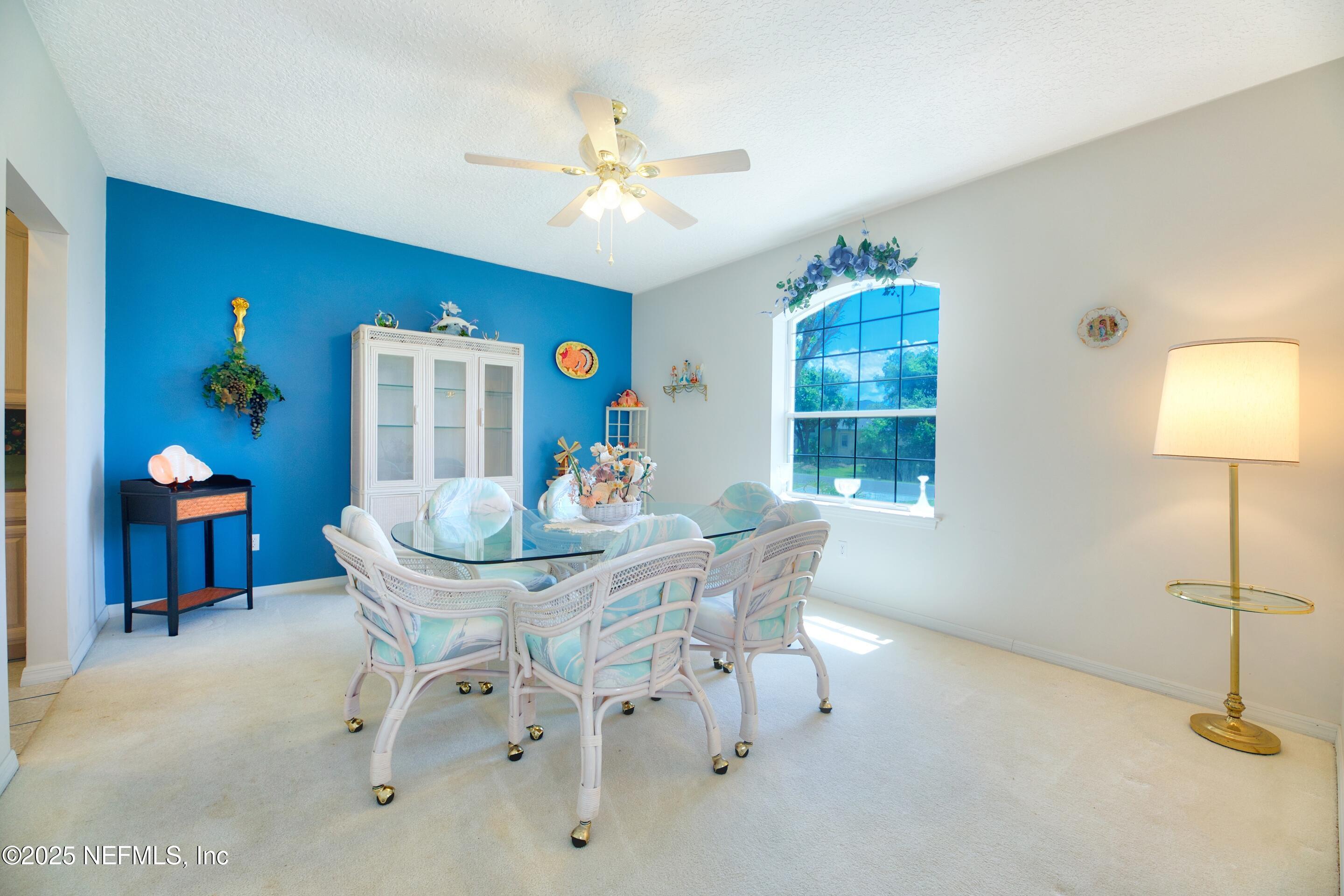 430 Marsh Point Circle St. Augustine, FL 32080 - Photo 14 of 69 a view of a dining room with furniture