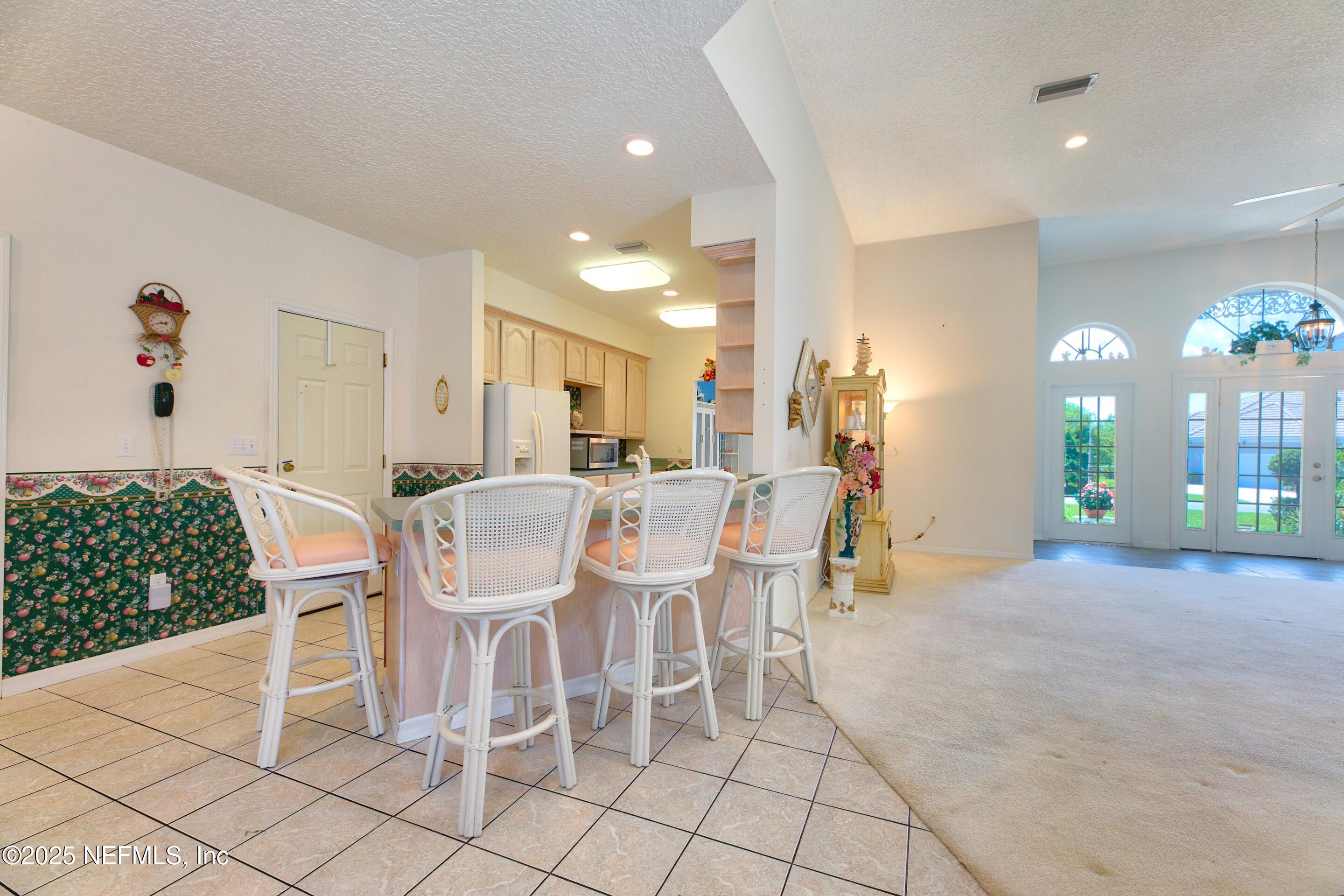 430 Marsh Point Circle St. Augustine, FL 32080 - Photo 15 of 69 a dining room with furniture and window
