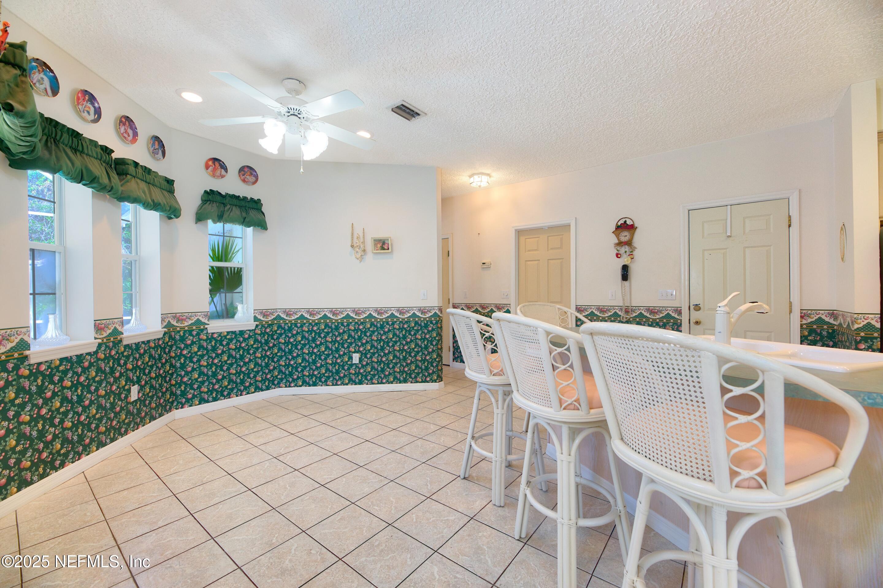 430 Marsh Point Circle St. Augustine, FL 32080 - Photo 17 of 69 a view of a dining room with furniture