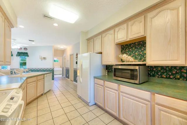 a bathroom with a shower and a toilet