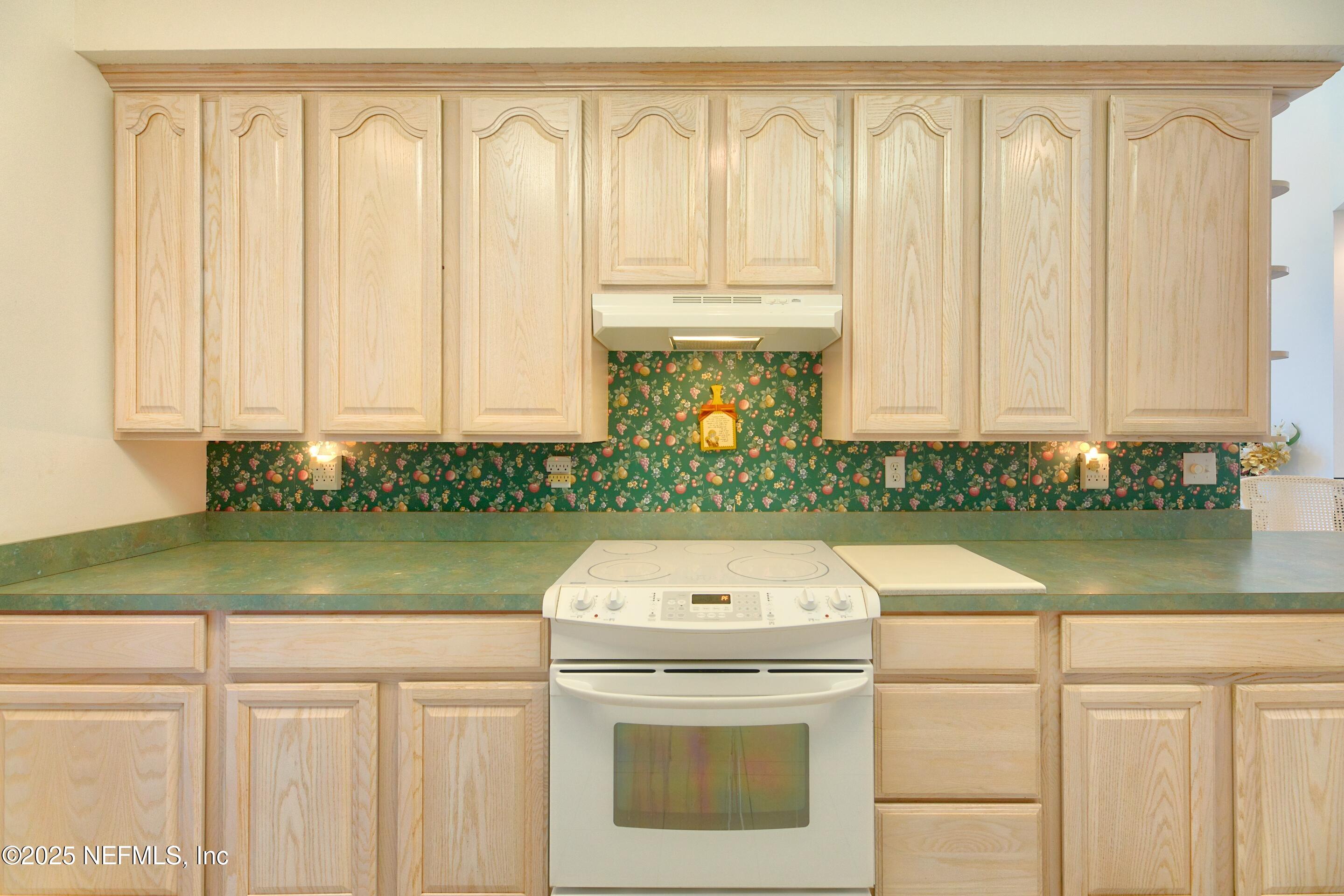 430 Marsh Point Circle St. Augustine, FL 32080 - Photo 26 of 69 a bathroom with a sink and a mirror