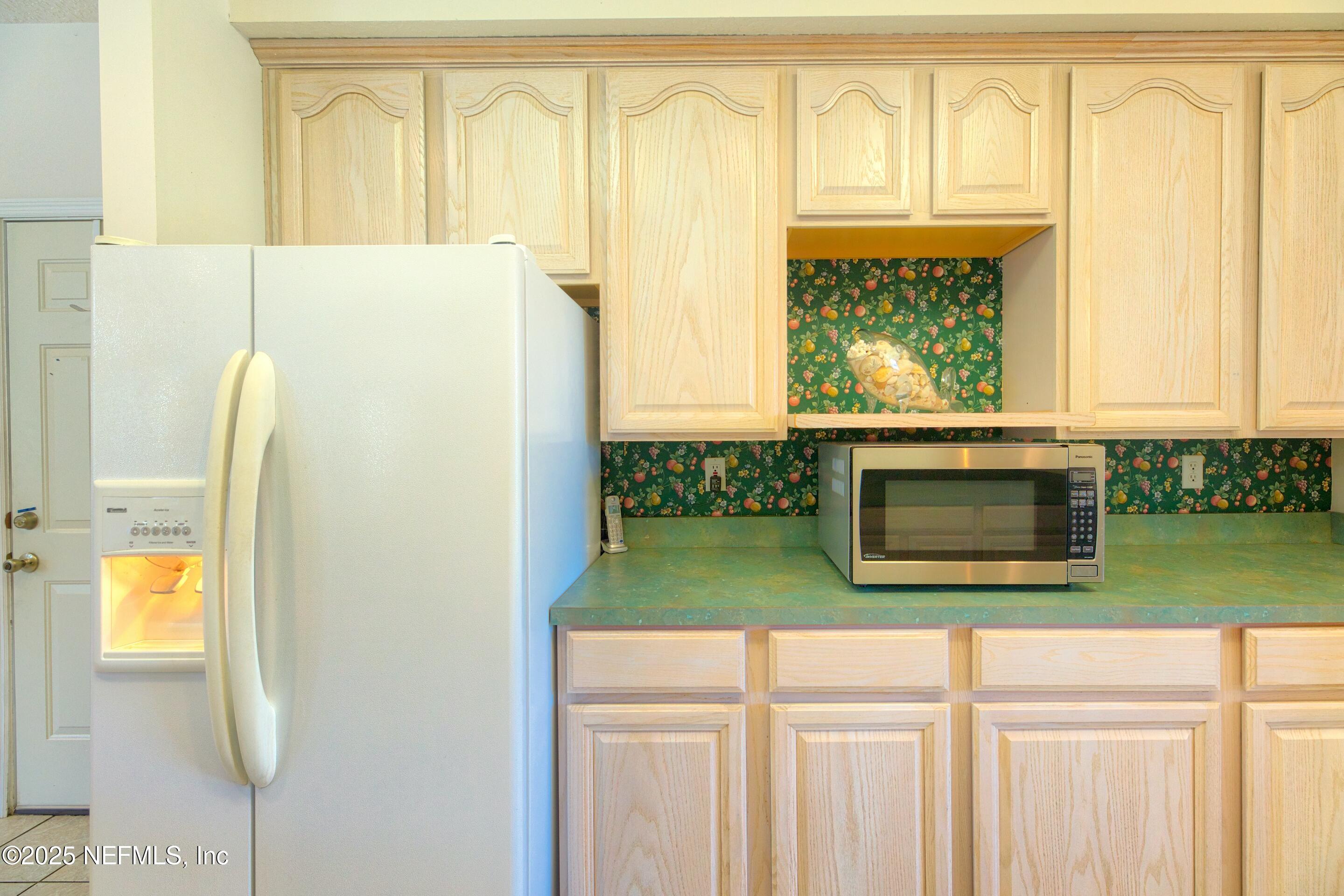 430 Marsh Point Circle St. Augustine, FL 32080 - Photo 27 of 69 a bathroom with a sink and a mirror