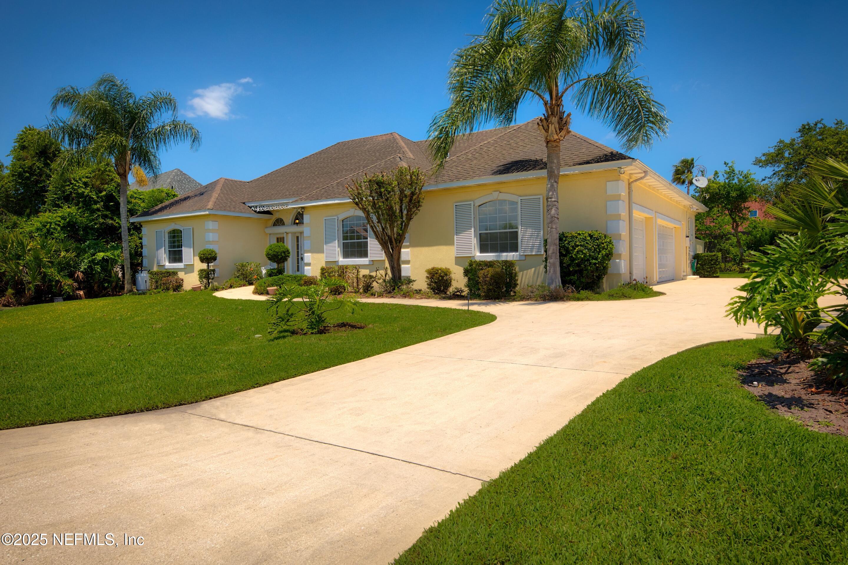 430 Marsh Point Circle St. Augustine, FL 32080 - Photo 3 of 69 a front view of house with yard and green space