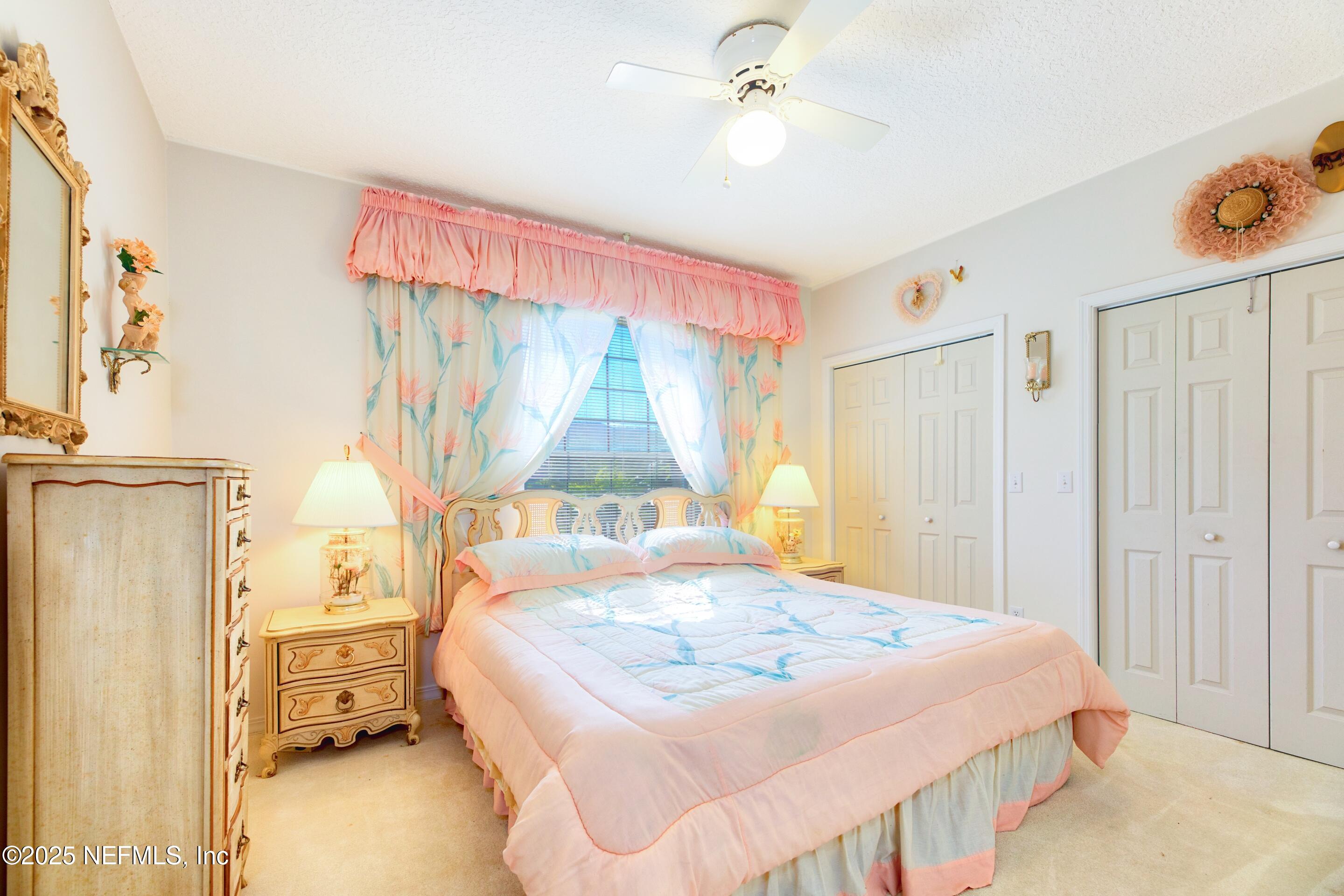 430 Marsh Point Circle St. Augustine, FL 32080 - Photo 33 of 69 a bedroom with a bed and a window