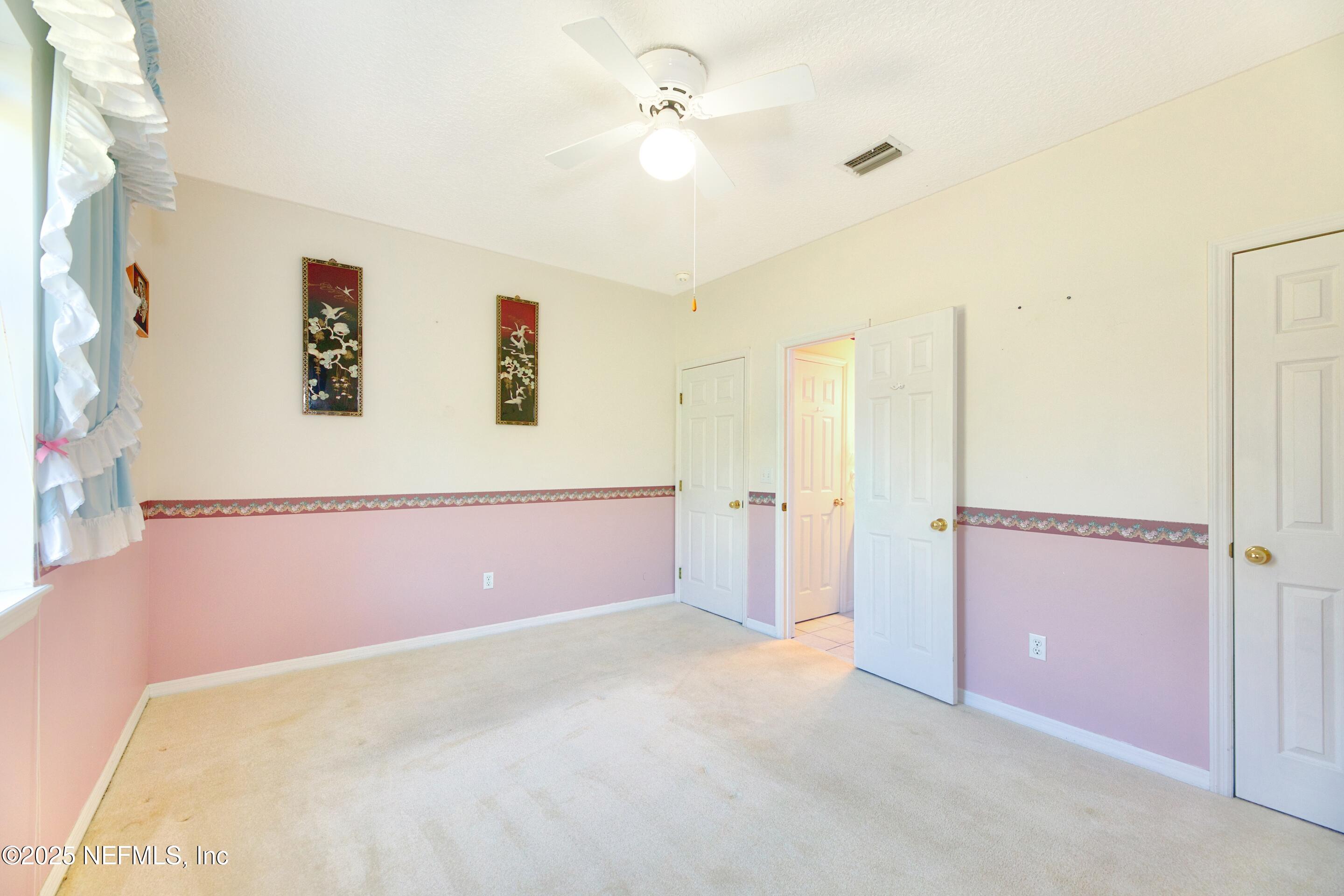 430 Marsh Point Circle St. Augustine, FL 32080 - Photo 35 of 69 a view of a big room with closet and windows