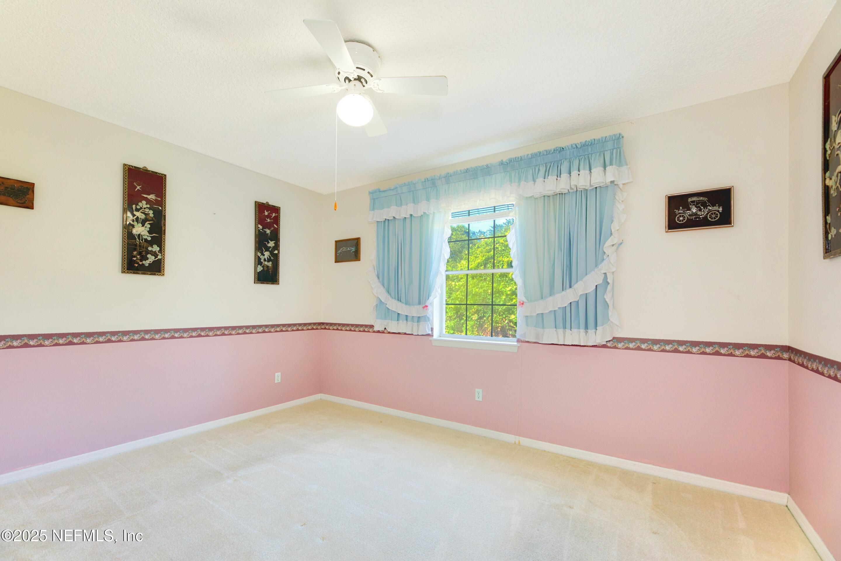 430 Marsh Point Circle St. Augustine, FL 32080 - Photo 37 of 69 a view of an empty room with a window