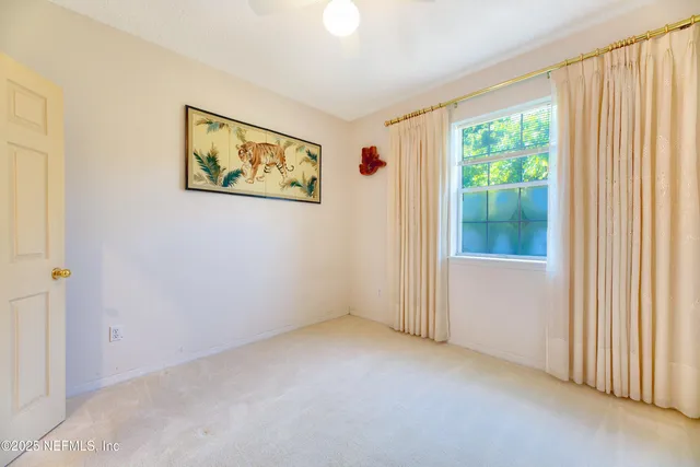 a front view of house with garden