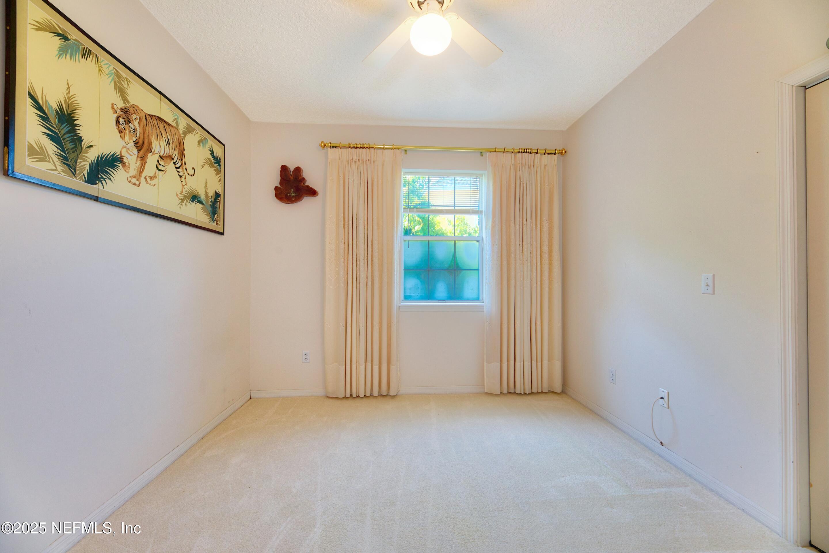 430 Marsh Point Circle St. Augustine, FL 32080 - Photo 42 of 69 an empty room with windows