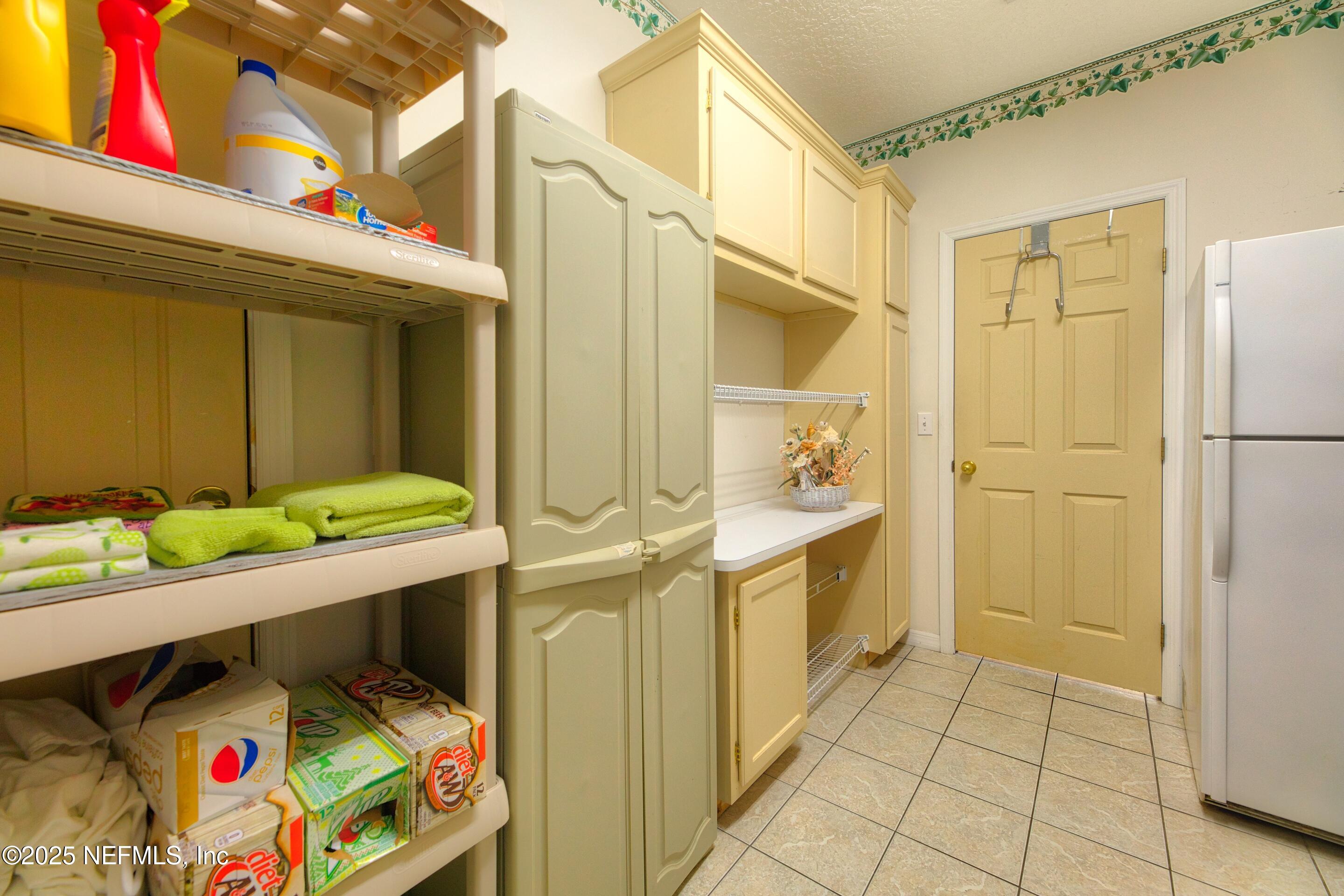 430 Marsh Point Circle St. Augustine, FL 32080 - Photo 53 of 69 a bathroom with a sink mirror vanity and toilet